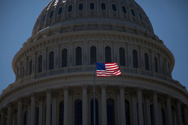 articles/2011/11/23/economic-news-we-re-thankful-for-this-thanksgiving/capitol-flag-karabell_f53wos