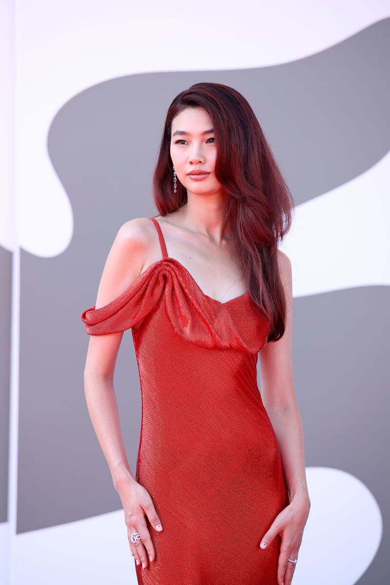 Hoyeon Jung poses on the red carpet during the Venice Film Festival on August 29, 2024.