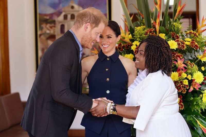 Prince Harry and Colombia's Vice President Francia Márquez shake hands, as Meghan, Duchess of Sussex, looks on, in Bogota, Colombia August 15, 2024.