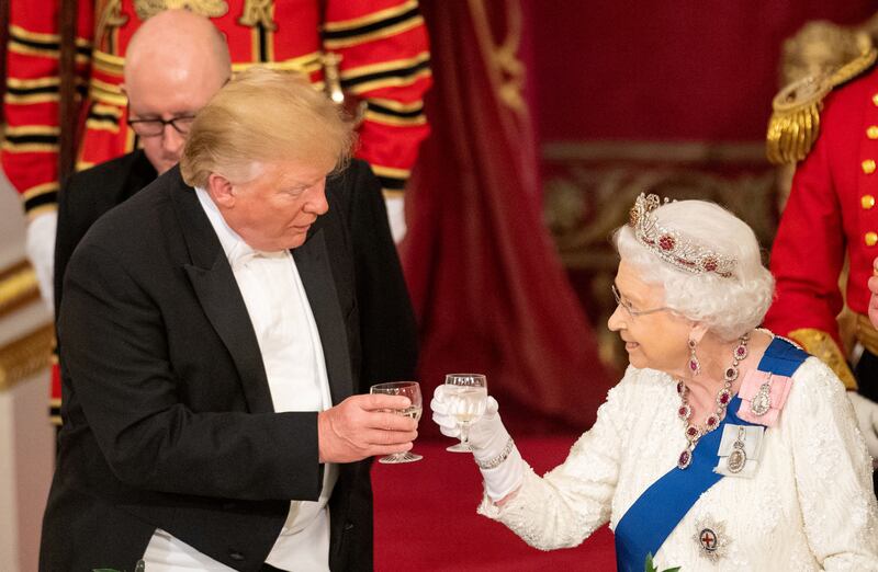 Then-President Donald Trump, left, and Queen Elizabeth at a State Banquet at Buckingham Palace in London, Britain, June 3, 2019.