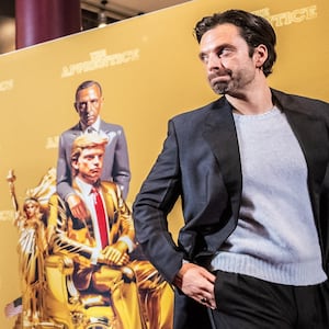 US-Romanian actor Sebastian Stan poses for a photo as he arrives for the gala premiere of the movie The Apprentice at the Imperial in Copenhagen, Denmark, on October 16, 2024. The explosive Donald Trump biopic "The Apprentice" premiered in Denmark after it hit US theaters, with filmmakers gambling that it will draw audiences in a fiercely polarized nation just weeks before its subject's election showdown with rival Kamala Harris. The hot-topic film about the Republican candidate's younger years has drawn legal threats from Trump's attorneys, not least for deeply unflattering scenes including a depiction of the former president raping his wife. (Photo by Emil Nicolai Helms / Ritzau Scanpix / AFP) / Denmark OUT