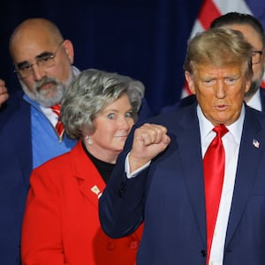 Donald Trump with his campaign advisers Susie Wiles and Chris LaCivita