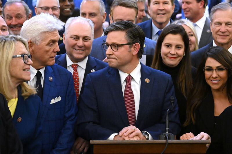 Photograph of Mike Johnson with Republican colleagues.