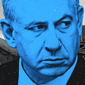 Benjamin Netanyahu in front of rubble in Israel