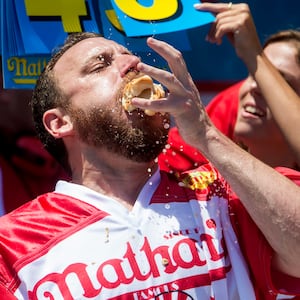 Joey Chestnut competes in the annual Hot Dog Eating Contest at Coney Island