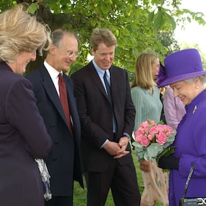 Britain's Queen Elizabeth II (right), Charles Spencer (center) together with Robert and Jane Fellowes in August 1997.   