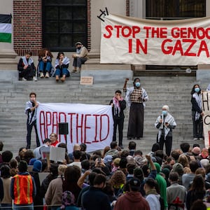 Supporters of Palestine gather at Harvard University to show their support for Palestinians in Gaza at a rally in Cambridge, Massachusetts, on October 14, 2023.