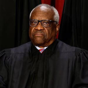 U.S. Supreme Court Associate Justice Clarence Thomas poses during a group portrait at the Supreme Court in Washington, U.S., October 7, 2022.