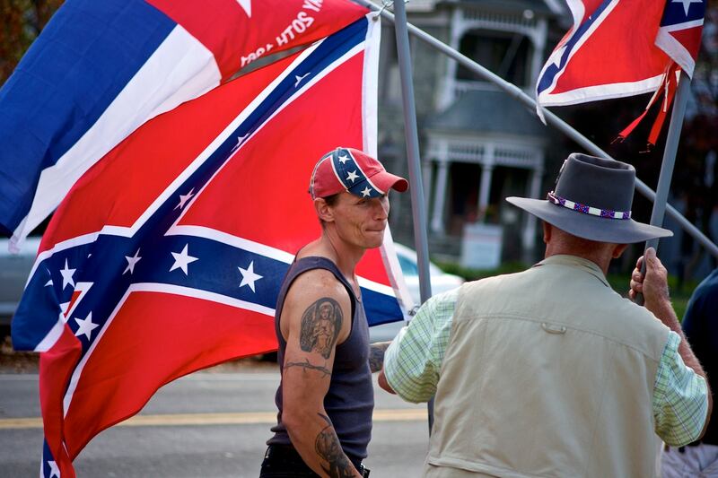 articles/2013/11/02/pro-confederate-protesters-in-richmond-rally-in-support-of-the-flag/confederate-flagger-in-richmond_krt9p3