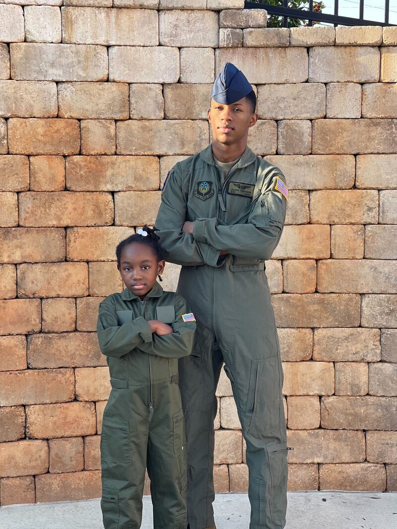 Roger Fortson with his little sister