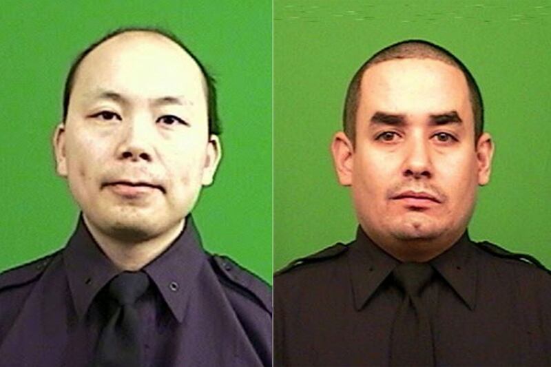 articles/2014/12/20/two-cops-assassinated-in-brooklyn/141220-daly-brooklyn-officers-embed_uvr8xb