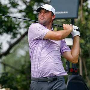 Scottie Scheffler hits his tee shot on the ninth hole during the third round of the Charles Schwab Challenge golf tournament on May 25, 2024 in Forth Worth, Texas.