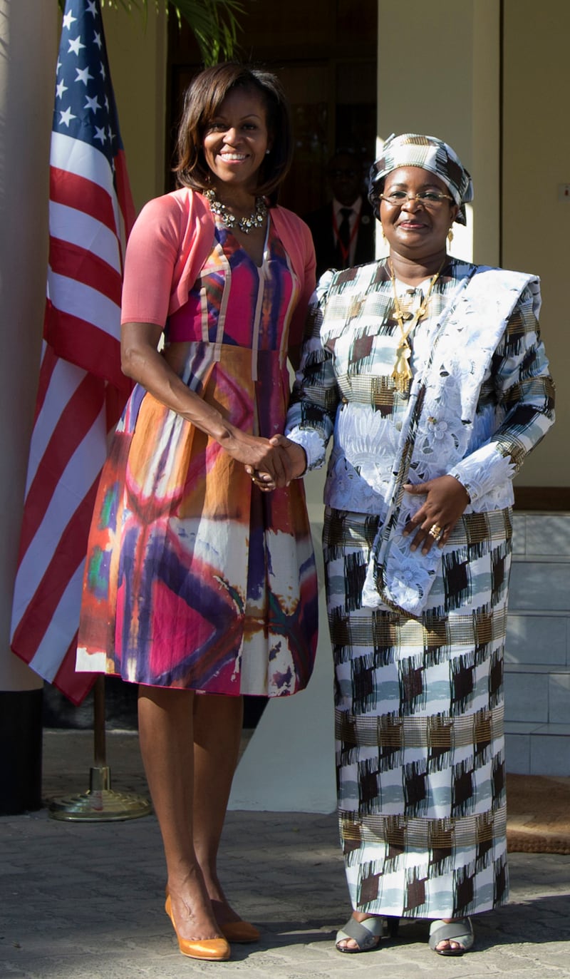 galleries/2010/05/07/first-lady-fashion/130709-michelle-obama-pink-purple-print-dress_dbagpq