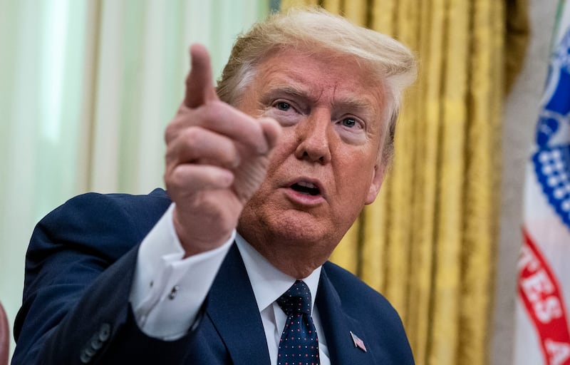 A photo including Former US President Donald Trump in The Oval Office