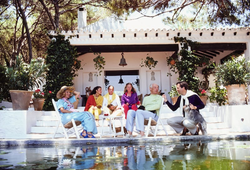 A photograph of the Rothschild family round the pool at their home the villa Santa Margarita in Marbella, Spain, August 1980.