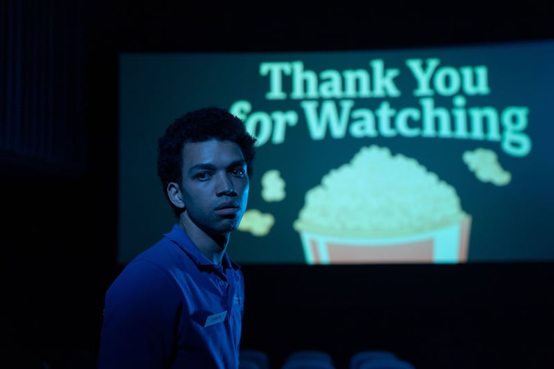 Justice Smith stands in a still from ‘I Saw the TV Glow’