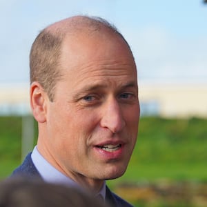 Prince William speaks at an outdoor event