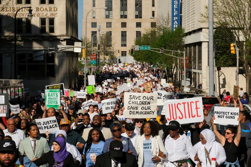 Justin Jones and his supporters march to the Capitol after being reinstated by the city council