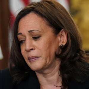 Kamala Harris looks down.