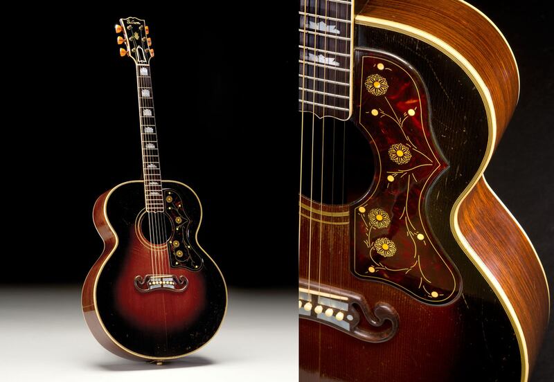 galleries/2014/04/01/a-collection-of-250-remarkable-acoustic-guitars-goes-on-the-auction-block-photos/acoustic-guitar-auction-1941-gibson-sj200_qagiqs