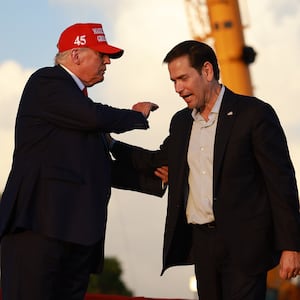 Donald Trump stands with Sen. Marco Rubio (R-FL) during a rally at the Miami-Dade County Fair and Exposition