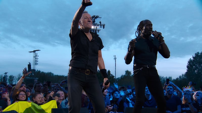 Bruce Springsteen and Curtis King onstage.