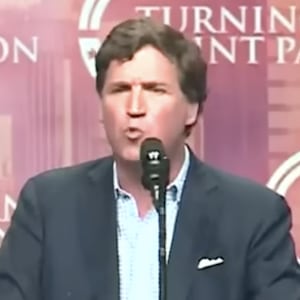 Tucker Carlson speaks at a rally for Donald  Trump