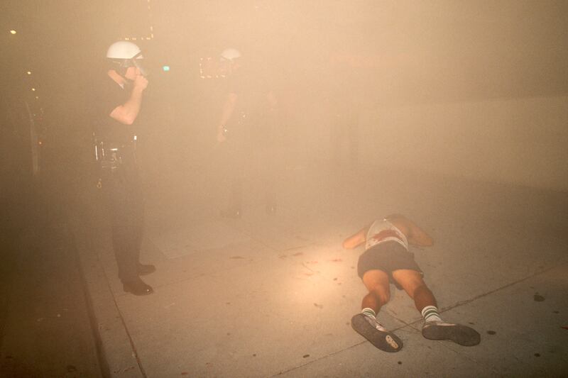 galleries/2012/04/26/dramatic-l-a-riots-photos/los-angeles-riots-dead-body_i6y4it