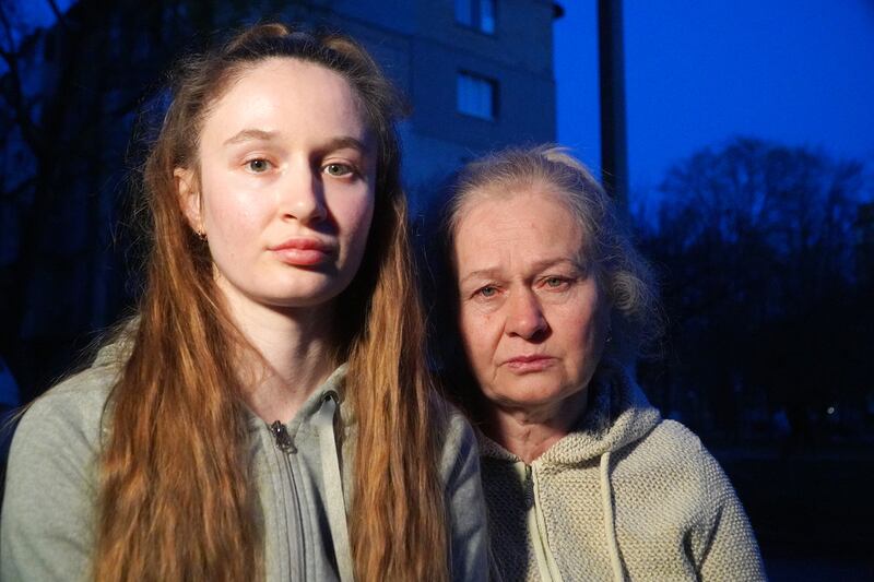 Irina and Valentina outside their apartment in Kharkiv. They