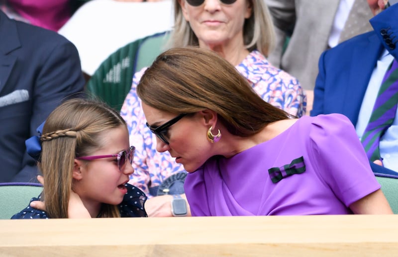 Princess Charlotte of Wales and Catherine, Princess of Wales court-side of Centre Court during the men's final on day fourteen of the Wimbledon Tennis Championships at the All England Lawn Tennis and Croquet Club on July 14, 2024 in London, England.