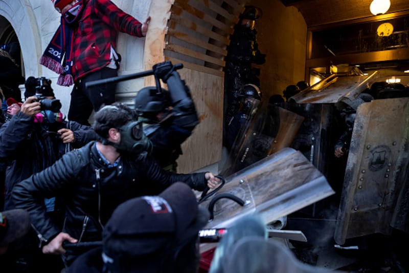 Trump supporters clash with police and security forces as people try to storm the US Capitol on January 6, 2021 in Washington, DC.