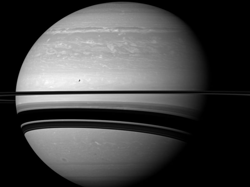 articles/2015/08/16/cassini-buzzes-saturn-s-moons-for-the-last-time/150814-branom-saturn-moons-embed_orrd5e