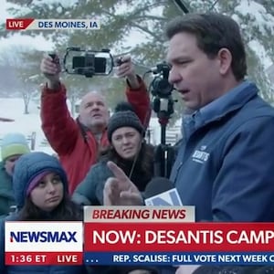 Ron DeSantis speaks to reporters. 