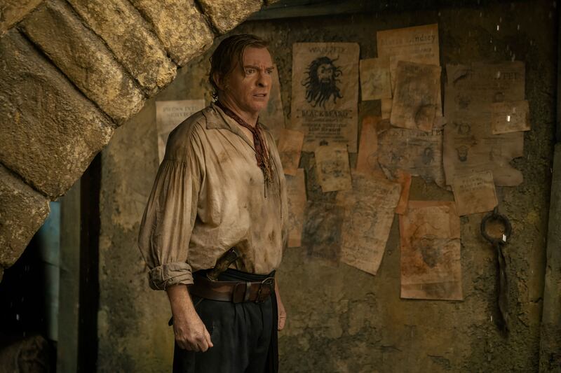 Rhys Darby standing in a still from ‘Our Flag Means Death’