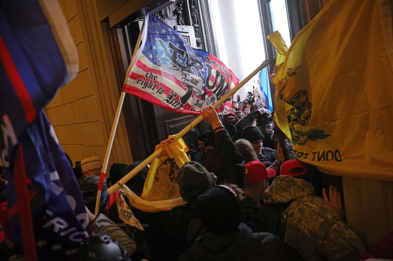 MAGA protesters attack the U.S. Capitol on Jan. 6 to try to impede Congress from ratifying Joe Biden's Electoral College win over Donald Trump.