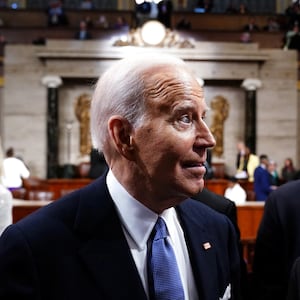 Joe Biden walks among the crowd of congressman after his State of the Union speech. 