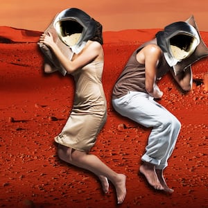 image of two people sleeping in silk pajamas with astronaut head gear with mars in the background red planet hibernation torpor passengers jennifer lawrence chris pratt sleep pod