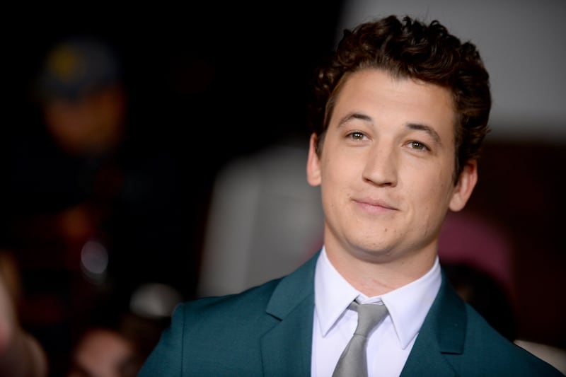 articles/2014/03/20/divergent-star-miles-teller-is-about-to-take-over-hollywood/140319-fallon-teller_ldm4ry