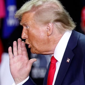 Former US President and Republican presidential candidate Donald Trump gestures as he speaks during a campaign rally at Van Andel Arena in Grand Rapids, Michigan on November 5, 2024.