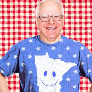 Tim Walz in a shirt with a smiley face on Minnesota