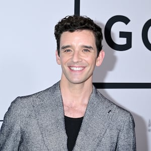 Michael Urie on a red carpet