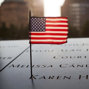 articles/2012/09/10/those-who-lost-loved-ones-on-9-11-cannot-forget-and-neither-should-america/911-memorial-daly_vweisc