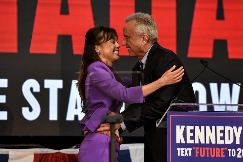 Independent presidential candidate Robert F. Kennedy, Jr. hugs Nicole Shanahan as she becomes his vice presidential candidate on Mar. 26, 2024.