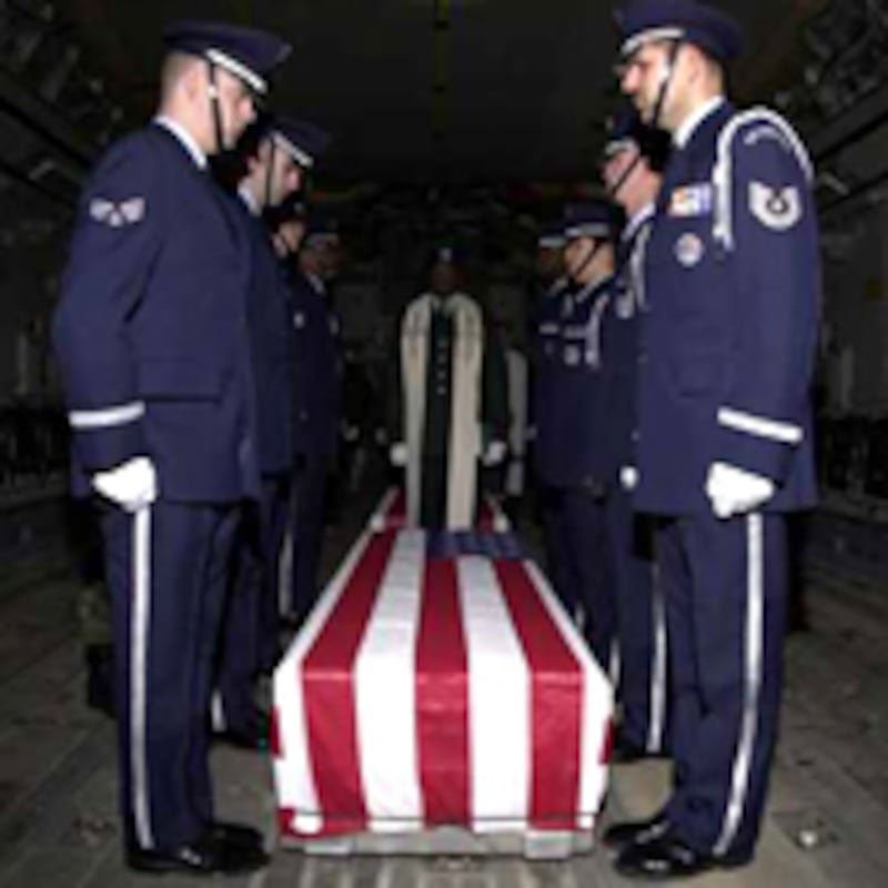 articles/2009/04/06/the-photos-bush-didnt-want-you-to-see/begleiter-coffins_21034_xnx7p3