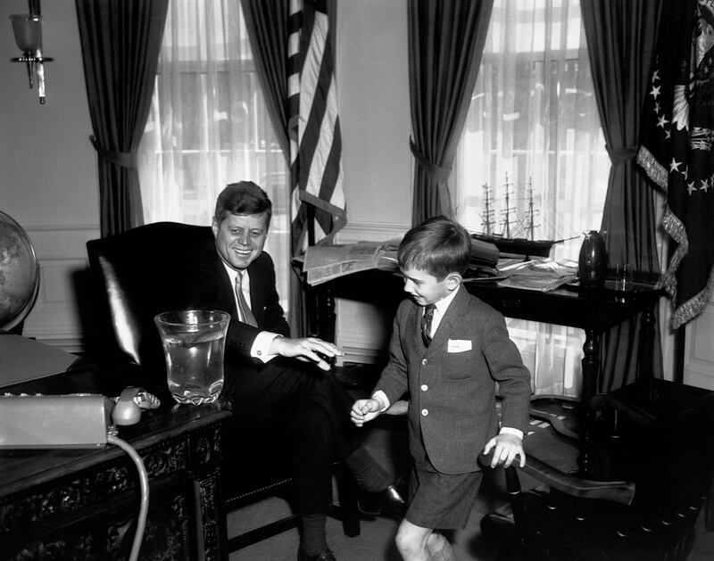 President John F. Kennedy with his nephew, Robert F. Kennedy Jr., in the Oval Office.