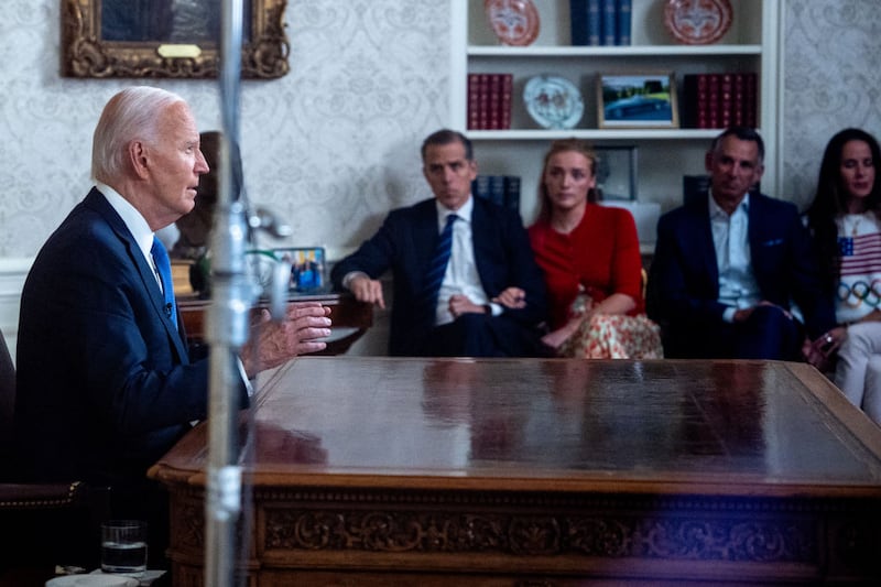 President Joe Biden, accompanied by his son, Hunter Biden, Hunter's daughter Finnegan Biden, Howard Krein, and Ashley Biden, speaks during an address to the nation about his decision not to seek reelection.