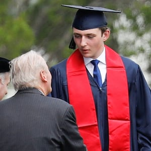 Side-by-side photos that Melania and Donald Trump attending their son Barron’s graduation.