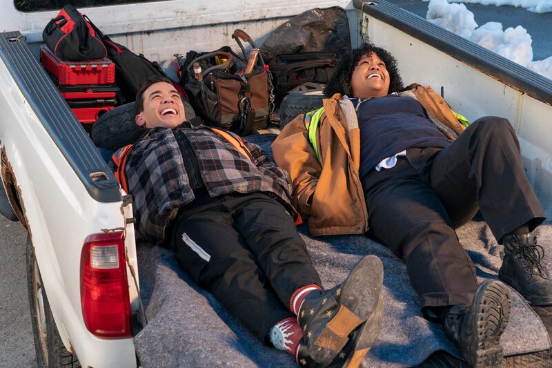 A photo still of Conrad Ricamora and Natasha Rothwell in 'How to Die Alone'