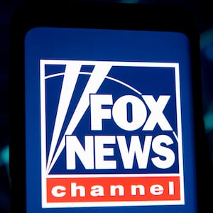 Photo illustration of a Fox News channel logo.