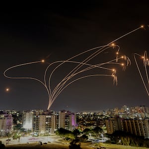 Israel's Iron Dome anti-missile system intercepts rockets launched from the Gaza Strip, as seen from the city of Ashkelon, Israel